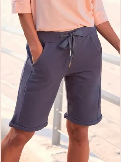 Bermudas en matière douce avec ceinture et poches pratiques