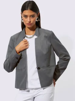 Blazer avec col montant et poches passepoilées raffinées
