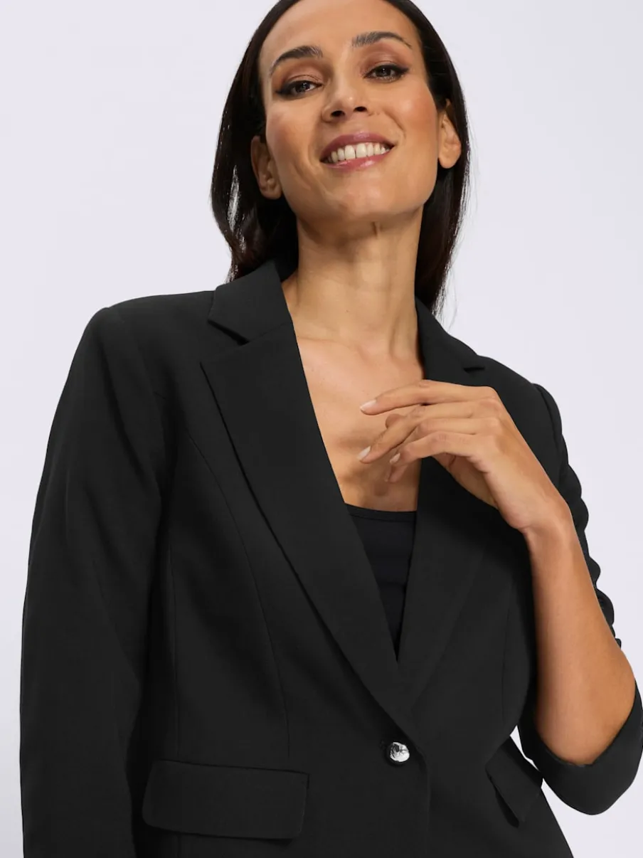 Blazer col à revers à effet affinant