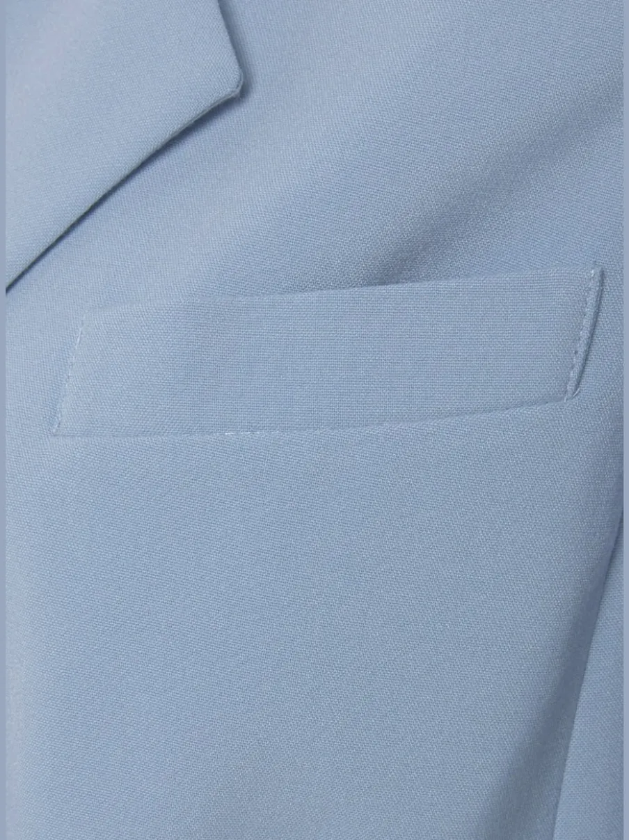 Blazer court à col à revers avec manches longues et poches