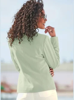 Blazer court à col à revers avec manches longues et poches
