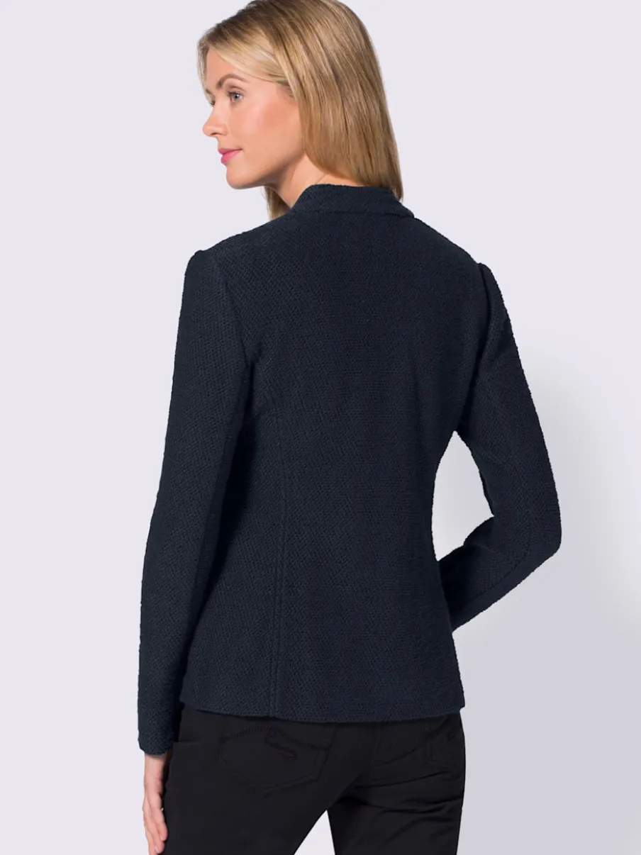 Blazer doux col montant à poches avec finition soignée