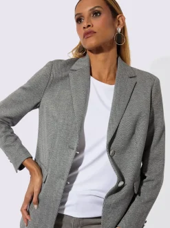Blazer en jersey à col revers et manches longues avec motif chevron