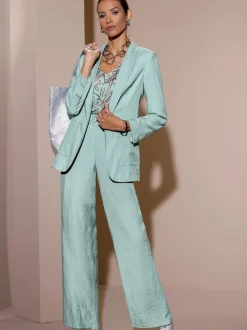 Blazer légèrement brillant avec col châle et manches longues