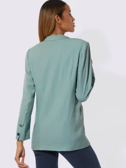 Blazer légèrement brillant avec col châle et manches longues