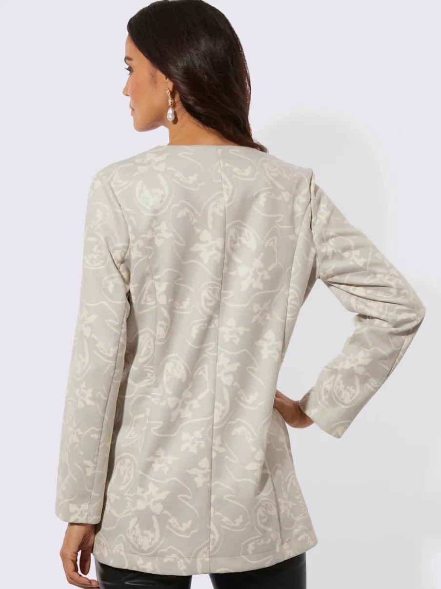 Blazer long à col rond et à patte de boutonnage avec motif floral