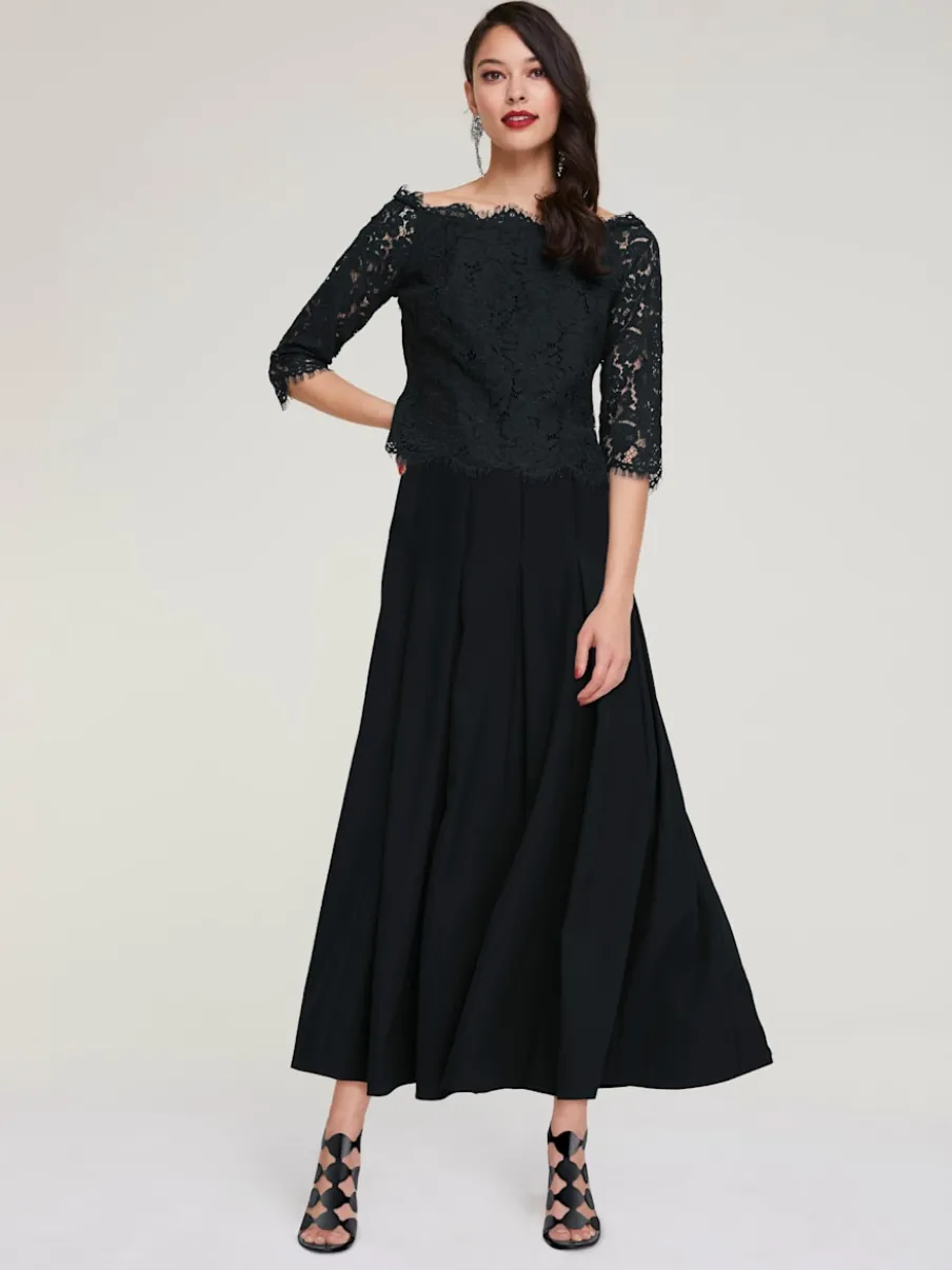 Blouse en dentelle raffinée à manches trois quarts