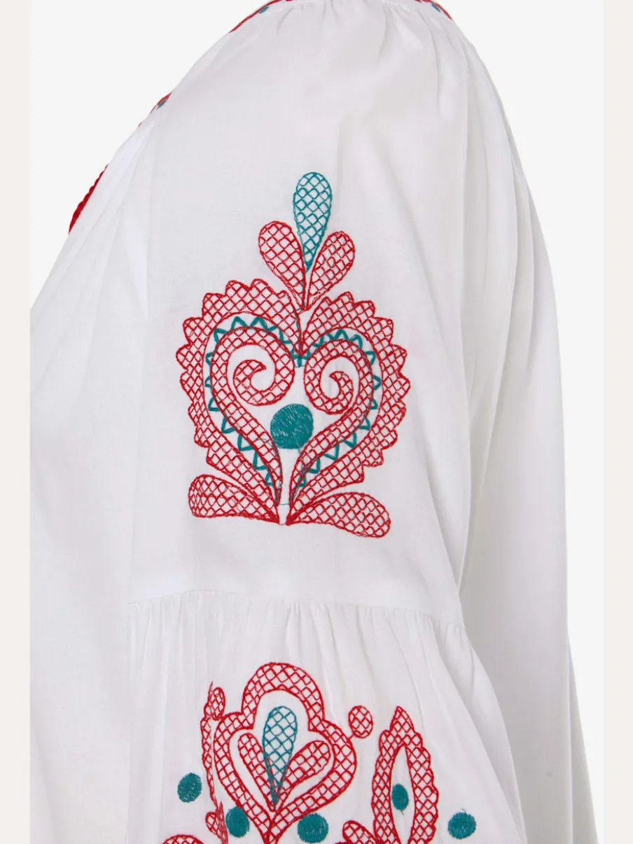 Blouse à manches larges avec broderie et houppes décoratives