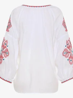 Blouse à manches larges avec broderie et houppes décoratives