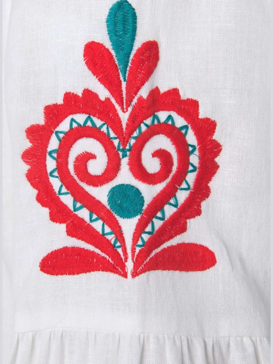 Blouse à manches larges avec broderie et houppes décoratives