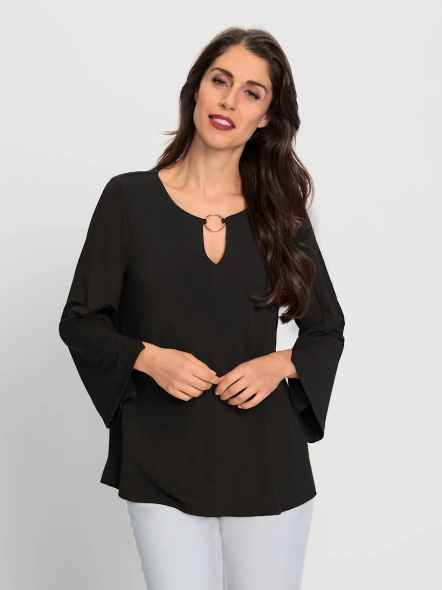 Blouse à manches trompette détails anneau fantaisie fluide
