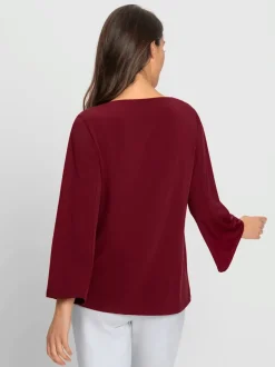 Blouse à manches trompette détails anneau fantaisie fluide