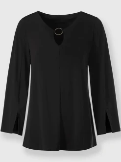 Blouse à manches trompette détails anneau fantaisie fluide