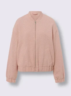 Blouson en bouclé avec petit col montant et poches