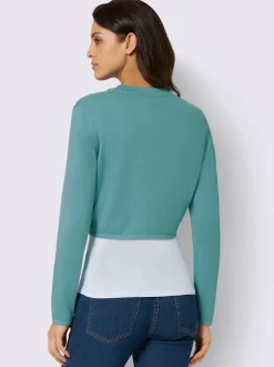 Boléro court en coton avec manches longues et finition soignée