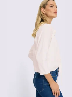 Boléro en tricot fin avec manches 3/4 et application florale