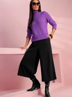 Bottes mélange de cuir et synthétique