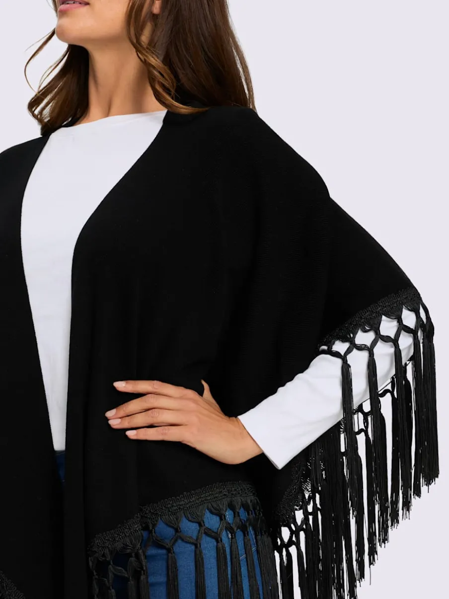 Cape en tricot bordure à franges