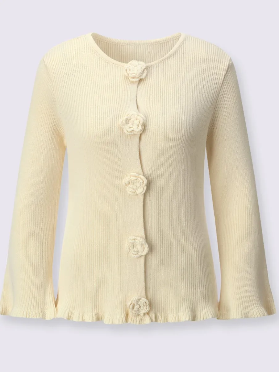 Cardigan à col rond et manches longues avec fleurs tricotées