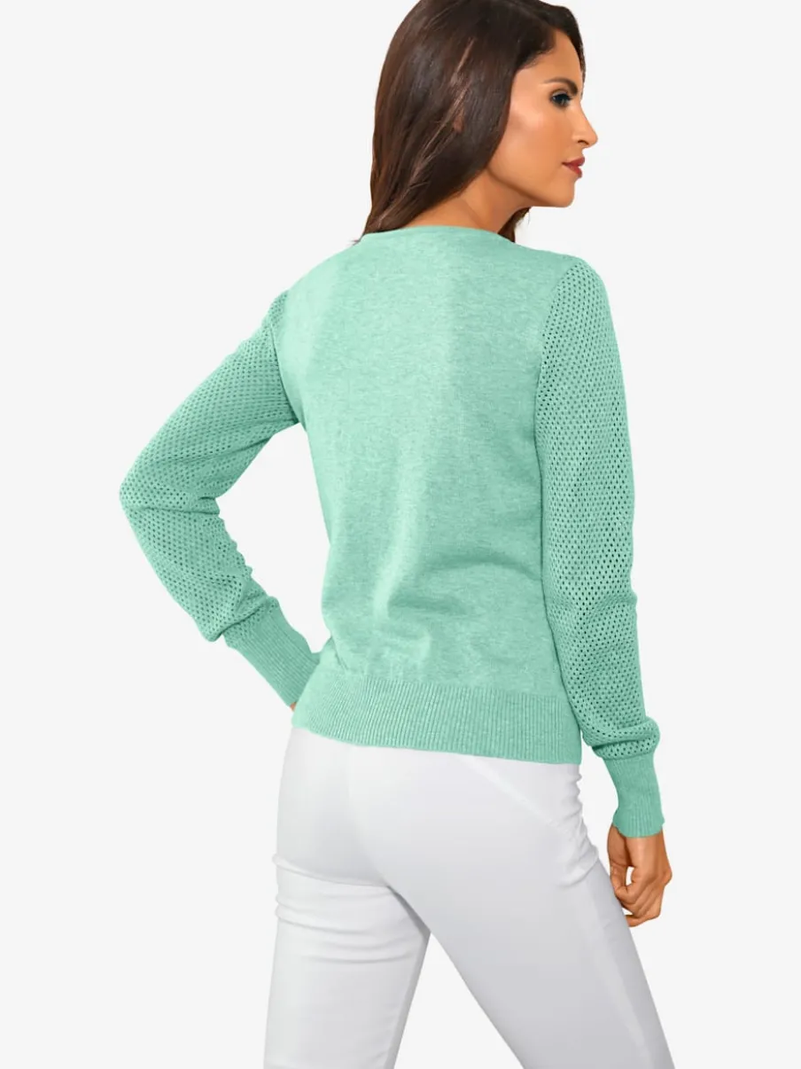 Cardigan en tricot ajouré avec manches longues zippé