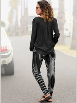 Chemisier avec patte de boutonnage et ourlet arrondi