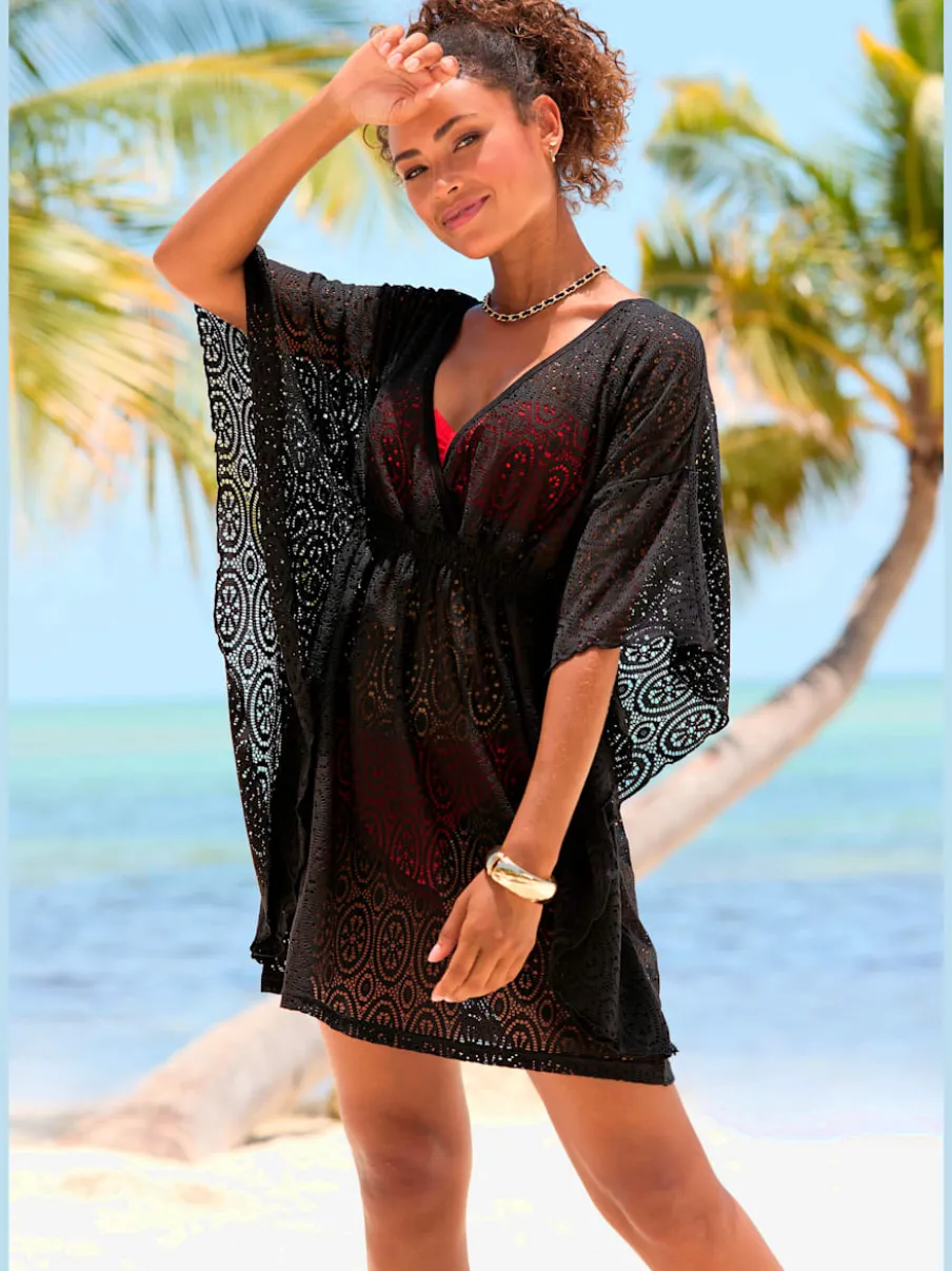 Chemisier caftan ajouré avec encolure en V devant