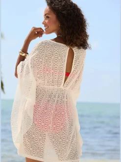 Chemisier caftan ajouré avec encolure en V devant
