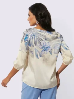 Chemisier à col en V avec motifs floraux et manches