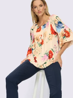 Chemisier à encolure Carmen avec motifs floraux et manches 3/4 volantes