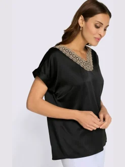 Chemisier en satin avec dentelle col V et mancherons