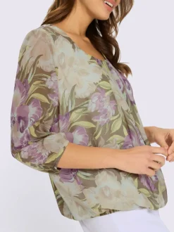 Chemisier fleuri avec col à plis et manches transparentes