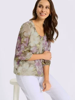 Chemisier fleuri avec col à plis et manches transparentes