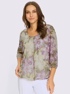 Chemisier fleuri avec col à plis et manches transparentes