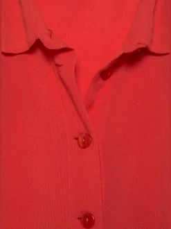 Chemisier long à col chemisier et manches courtes avec patte de boutonnage