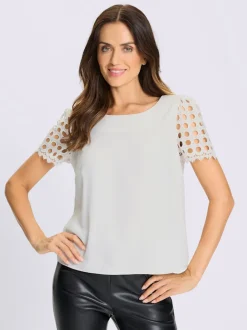Chemisier manches courtes en broderie ajourée transparente