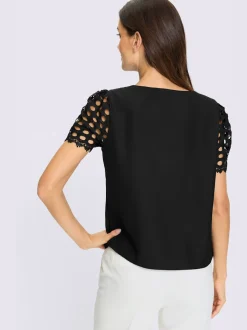 Chemisier manches courtes en broderie ajourée transparente