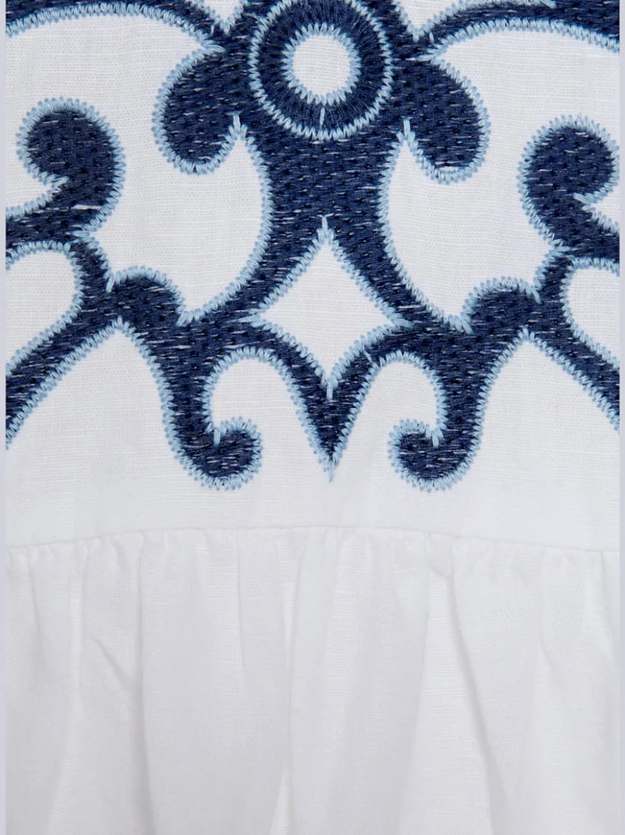 Chemisier à manches longues avec encolure en V et broderies raffinées