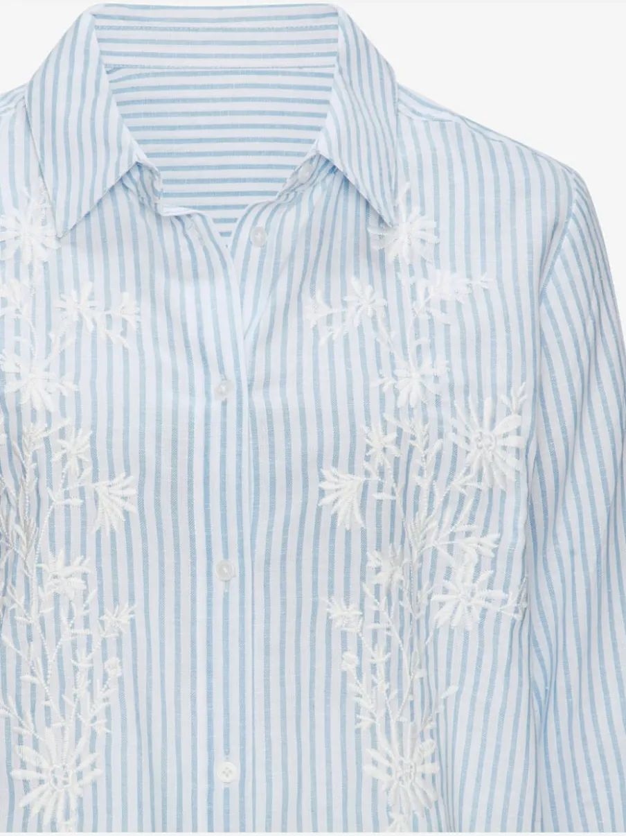 Chemisier à manches longues avec col chemise et détails floraux