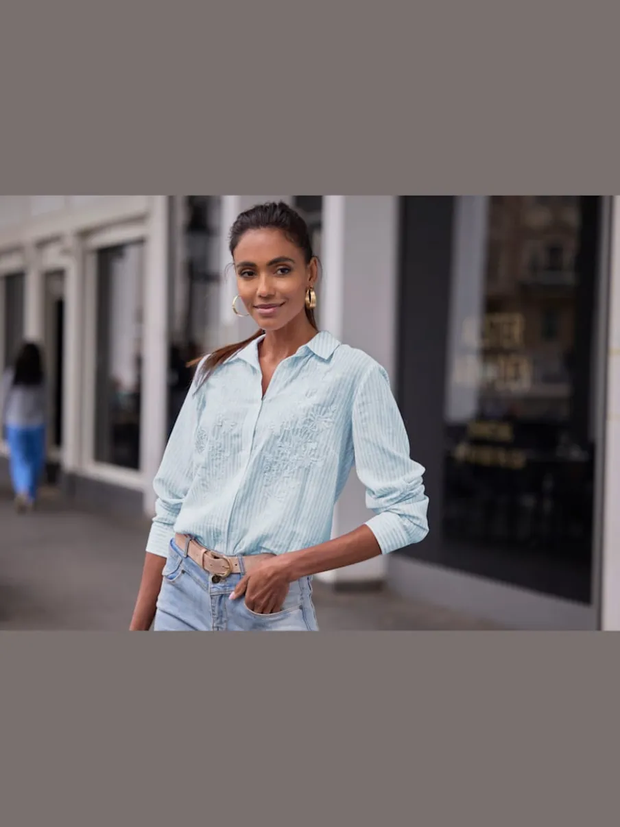 Chemisier à manches longues avec col chemise et détails floraux