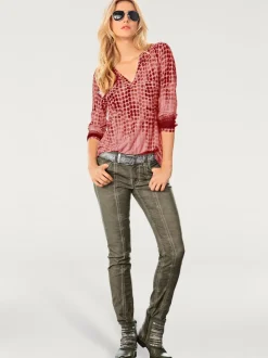 Chemisier à pois avec col en V et manches courtes
