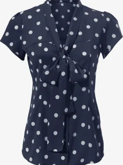 Chemisier à pois avec lavallière et manches courtes