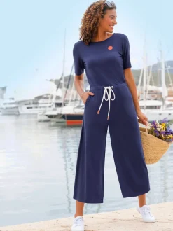 Combinaison avec col rond et manches courtes à jambes larges
