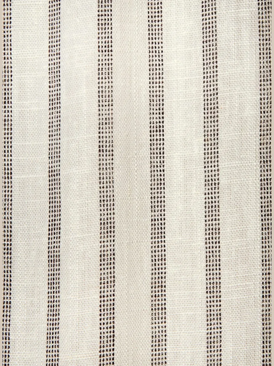 Combinaison courte avec patte de boutonnage et ceinture à nouer