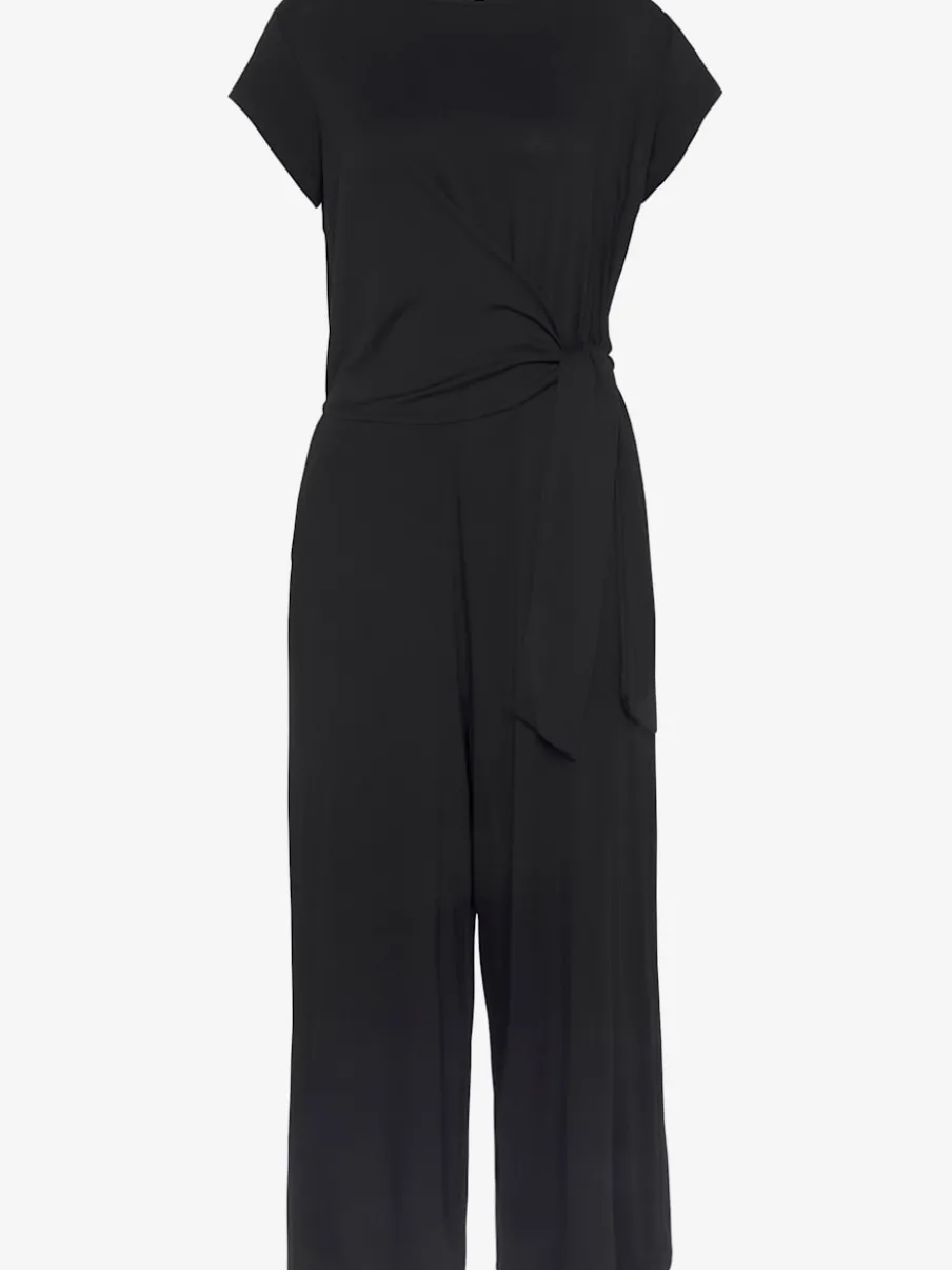 Combinaison pantalon large avec encolure ronde et poches latérales