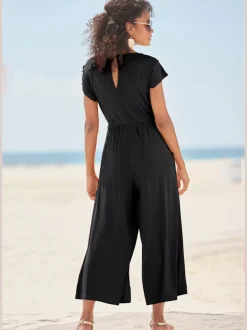 Combinaison pantalon large avec encolure ronde et poches latérales
