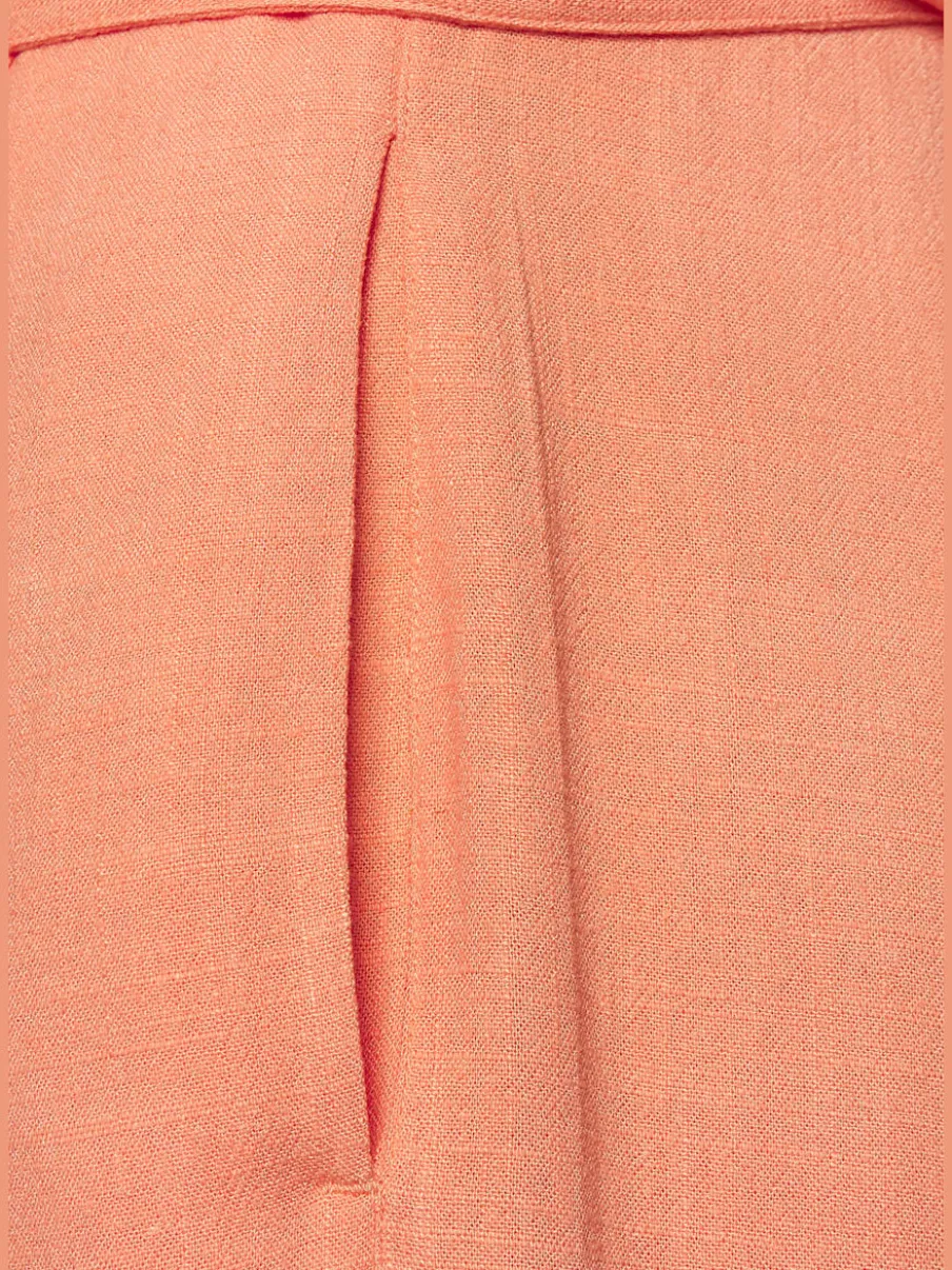 Combinaison sans manches avec ceinture et poches latérales