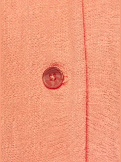 Combinaison sans manches avec ceinture et poches latérales