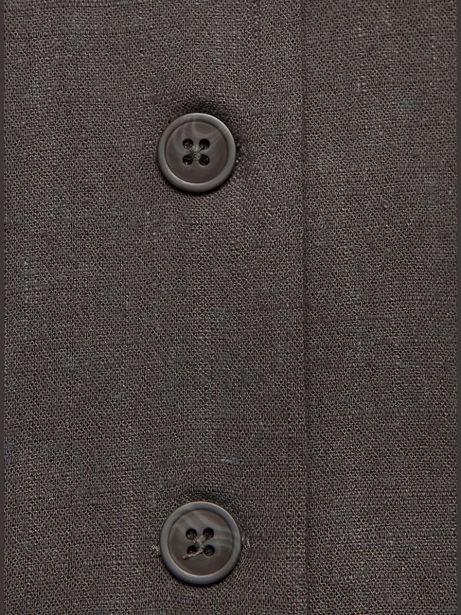 Combinaisons sans manches à ceinture et poches latérales