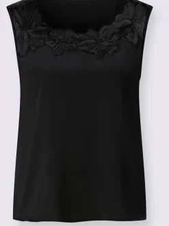 Débardeur en satin avec encolure en dentelle raffinée.