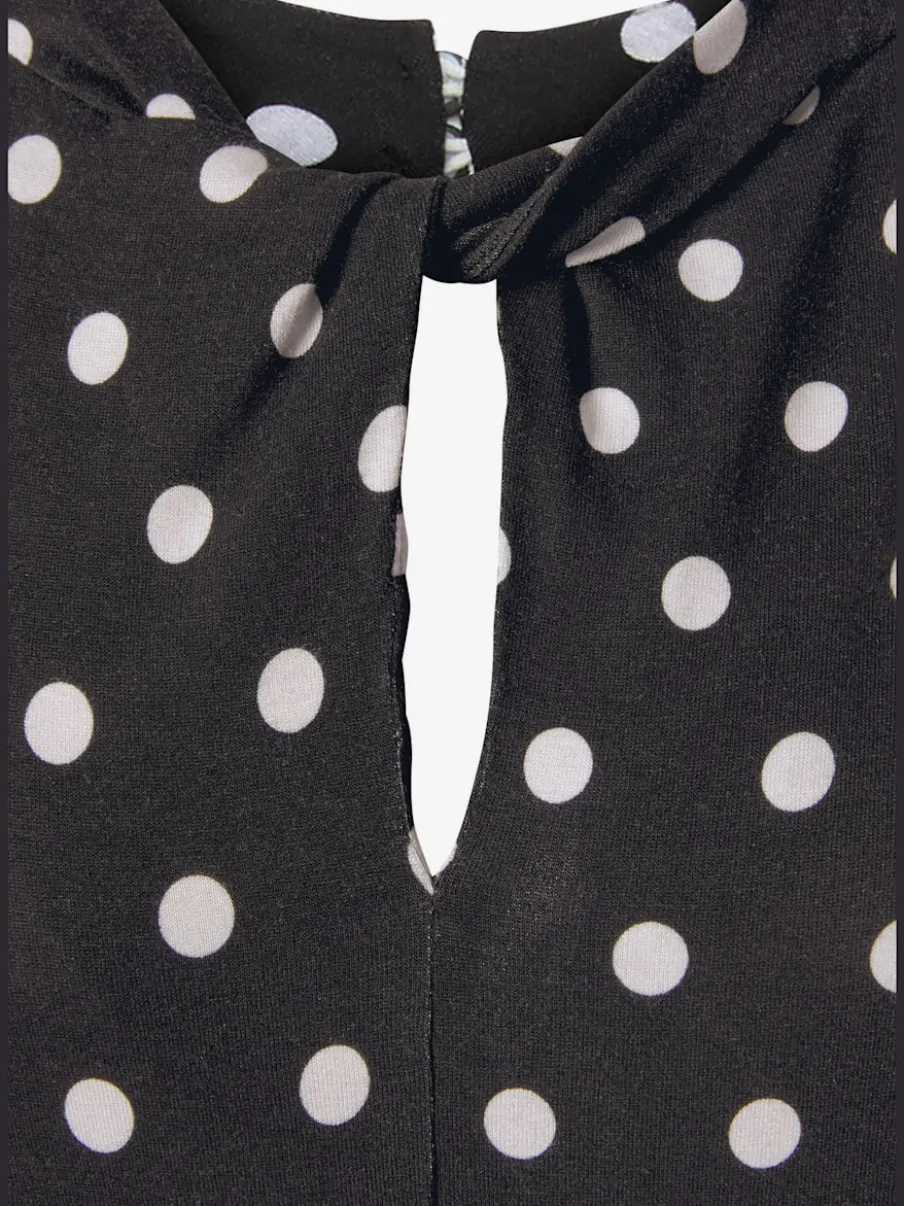 Débardeur à pois avec encolure fendue et sans manches